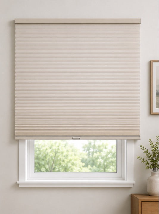 Outside mount cellular shade mounted over the window trim