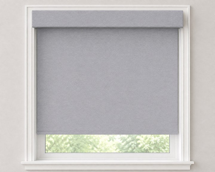 Fabric covered square cassette headrail on a roller shade