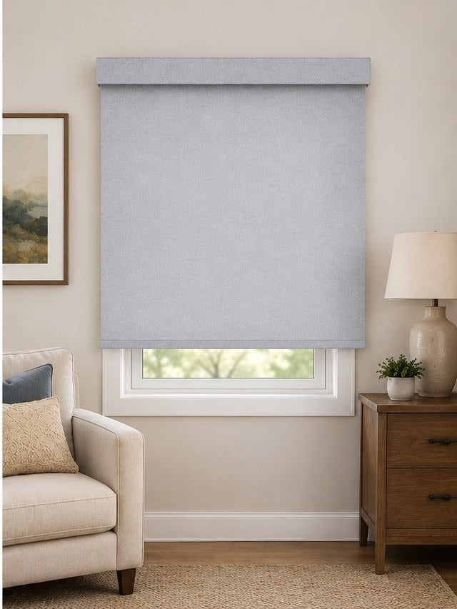Outside mount roller shade mounted over the window trim