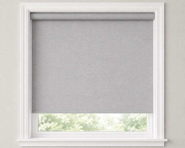 Open roll roller shade with the exposed fabric roll at the top
